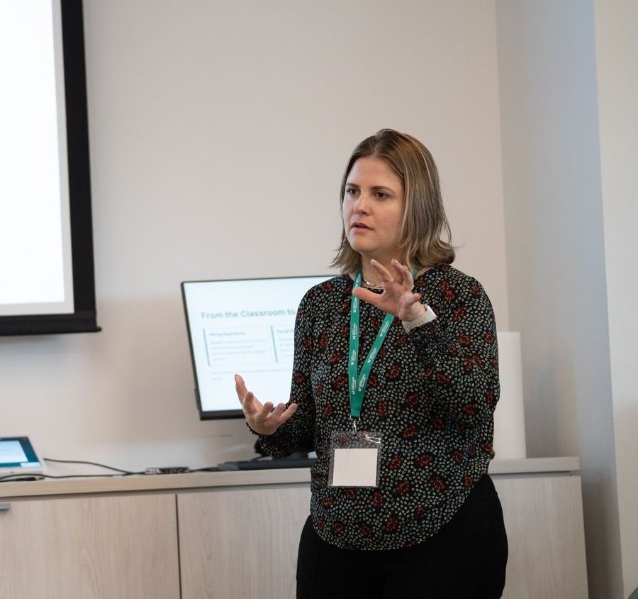 Dayane Reis presenting at the AI in Education Summit at USF
